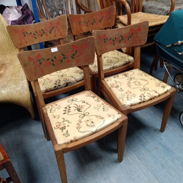 Set of four vintage 1930s Gomm dining chairs with floral seats.