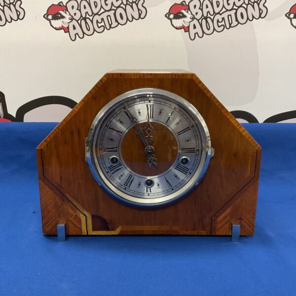 Vintage art deco Enfield mantle clock on display.