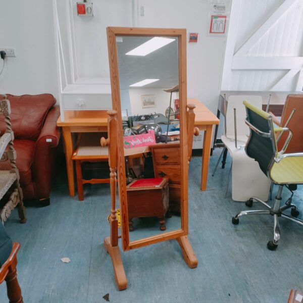 Antique full length dress mirror with wooden frame.