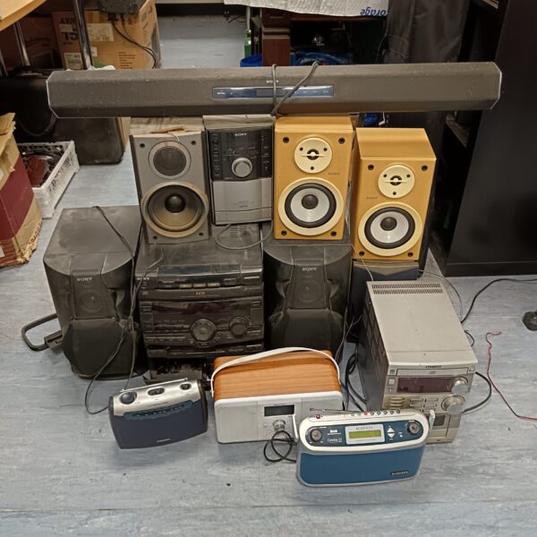 Vintage Sony boombox lot with multiple units stacked together.
