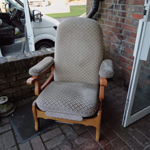 Vintage Everstyle recliner chair with patterned upholstery.