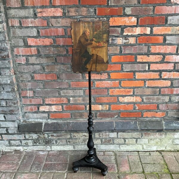 Antique Victorian fireside pole screen with embroidered panel.
