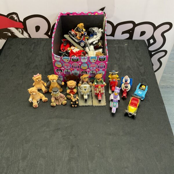 Mixed toy lot with bad bears, Disney toys, and a Corgi Brum model.