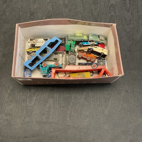 Vintage Matchbox diecast models in a mixed lot, including a car transporter.