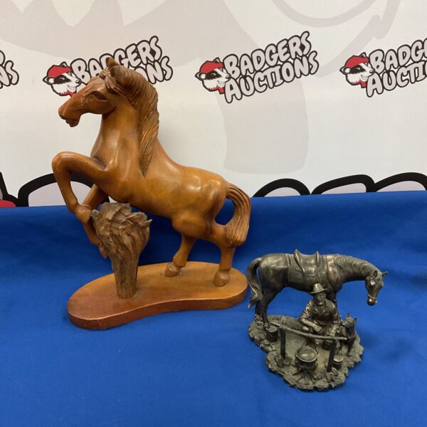 Detailed carved wooden horse sculpture for collectors.