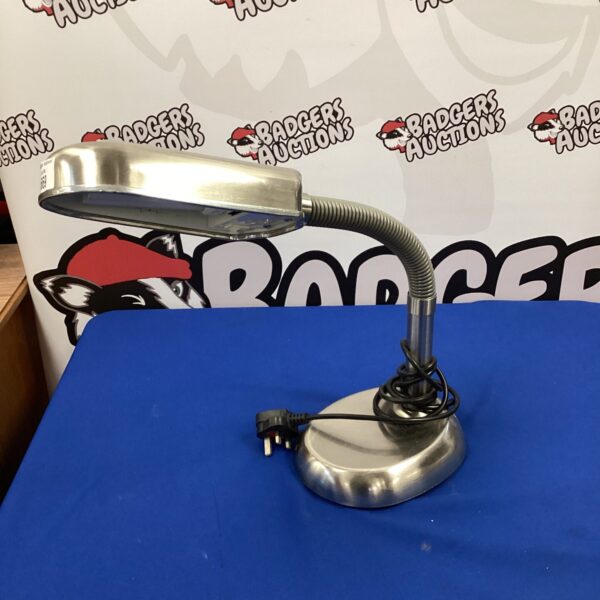 Vintage chrome reading light with adjustable arm.