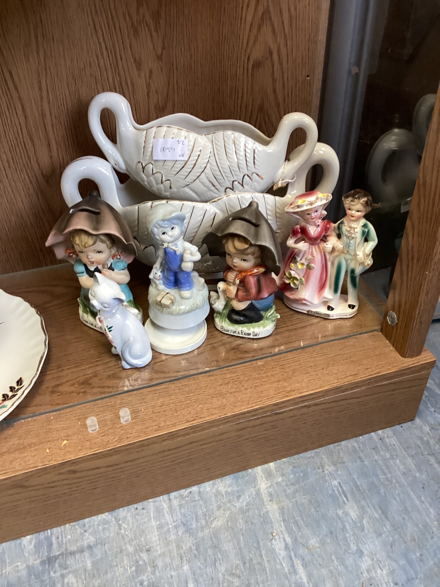 289 Collection of porcelain figurines and flower holders