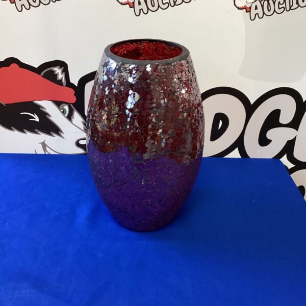 Close-up of a textured cracked glass vase.