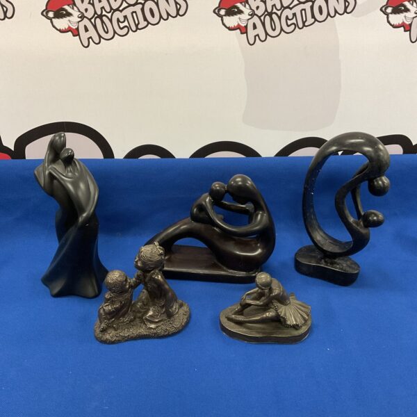 Collection of bronze resin sculptures including ballerina and mother & child.