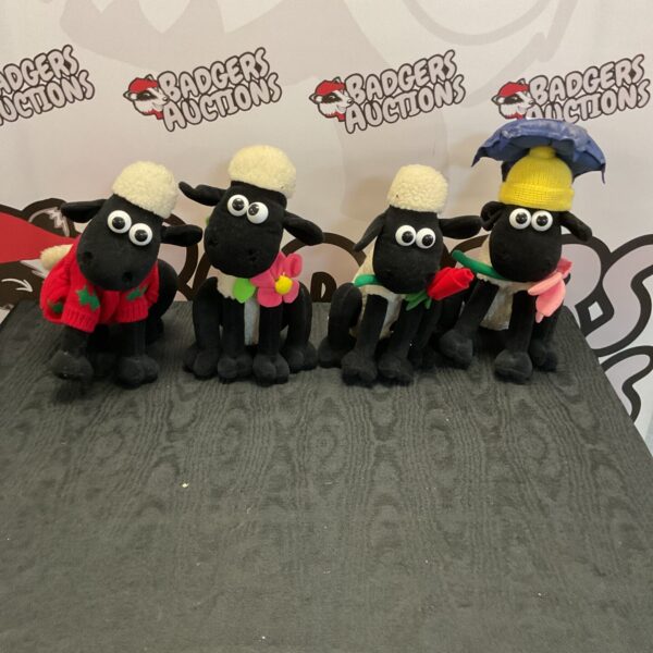 Shaun the Sheep plush collection featuring four character toys.