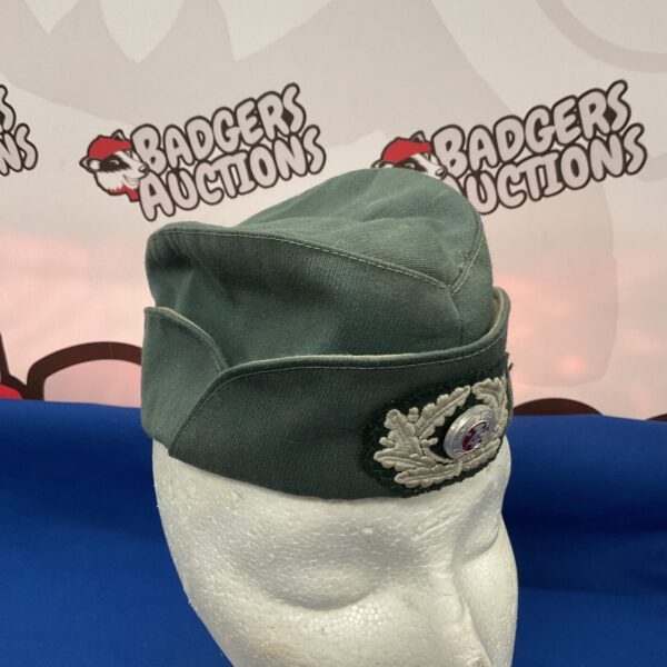 Vintage East German NVA side hat, a collectible military cap.