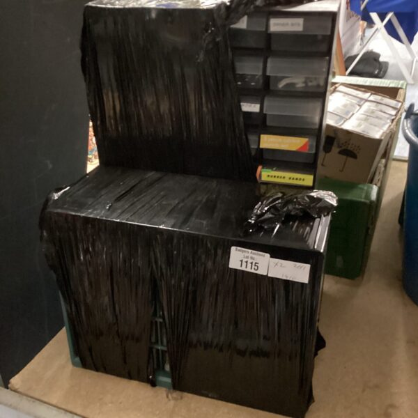 Stacked plastic storage drawers with contents, vintage storage solution.