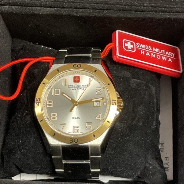 Swiss Military Hanowa watch with grey and gold dial in box.