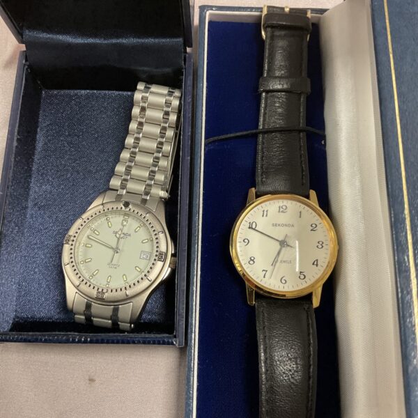 Lot of two Sekonda stainless steel analogue wristwatches.