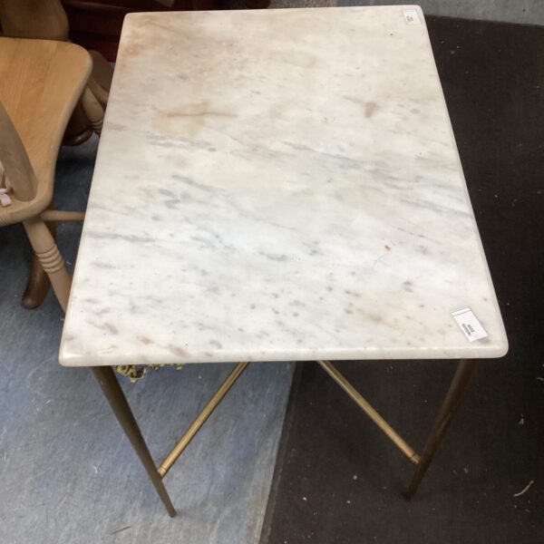 Vintage marble top side table with metal frame.