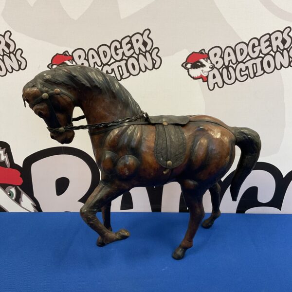 Detailed vintage leather Liberty style horse sculpture.