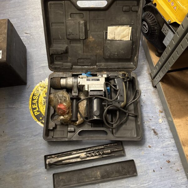 Powerbase SDS drill in open case with accessories.