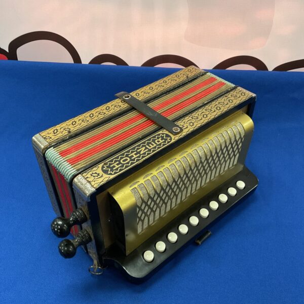 Vintage Hohner 10 key accordion in good condition.