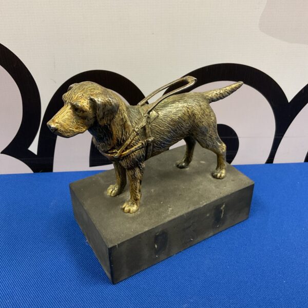 Vintage Louis Lejeune bronze guide dog sculpture on black base.