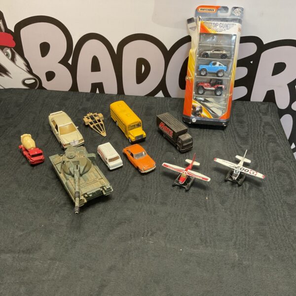 Diecast model collection including Matchbox Top Gun Maverick and Dinky Toys.