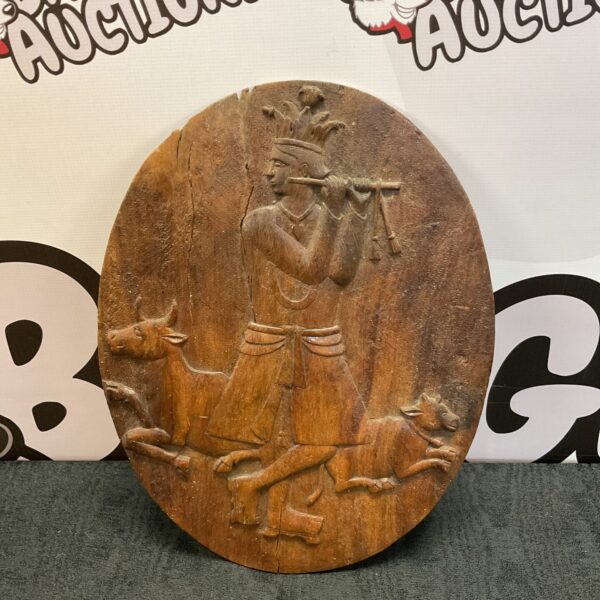 Antique 19th-century Indian carved wooden panel with detailed relief.