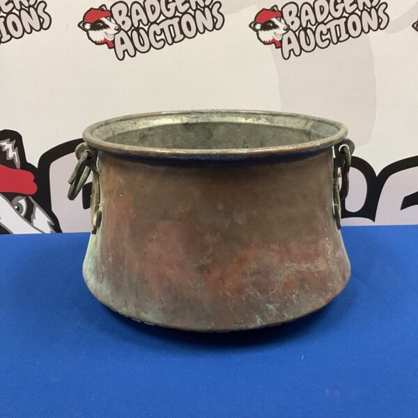 Antique copper stock cauldron with dovetailed seam and handles.