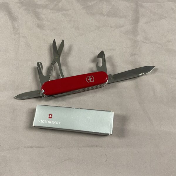 Vintage red handled Victorinox Swiss Army Knife in original box.