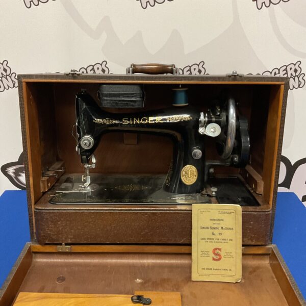 Vintage Singer Model 99 sewing machine in original condition.
