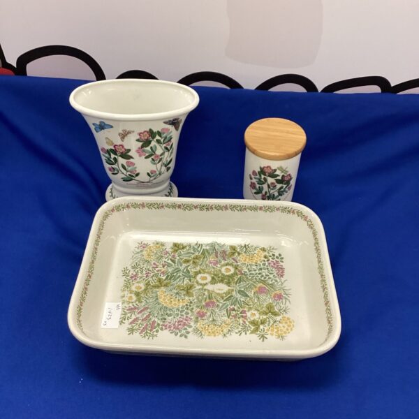 Vintage Portmeirion flan dish with colourful floral design.