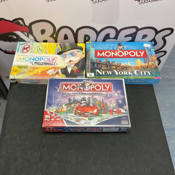 Lot of three vintage Monopoly board games, including themed editions.