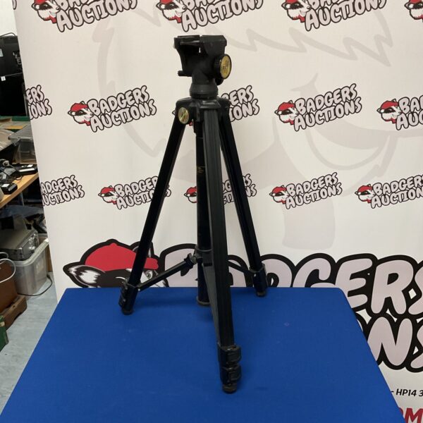 Heavy-duty camera tripod with adjustable legs and pan tilt head.