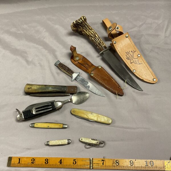 Vintage lot of sheath and pocket knives with bone handles.