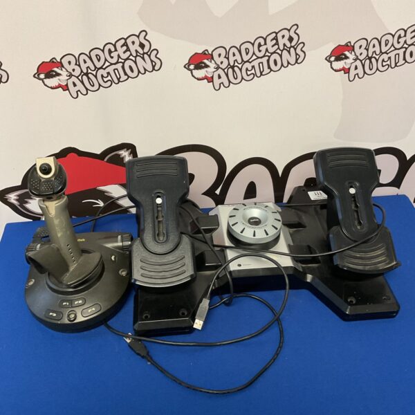 Saitek pro flight joystick and rudder pedals for flight simulation.
