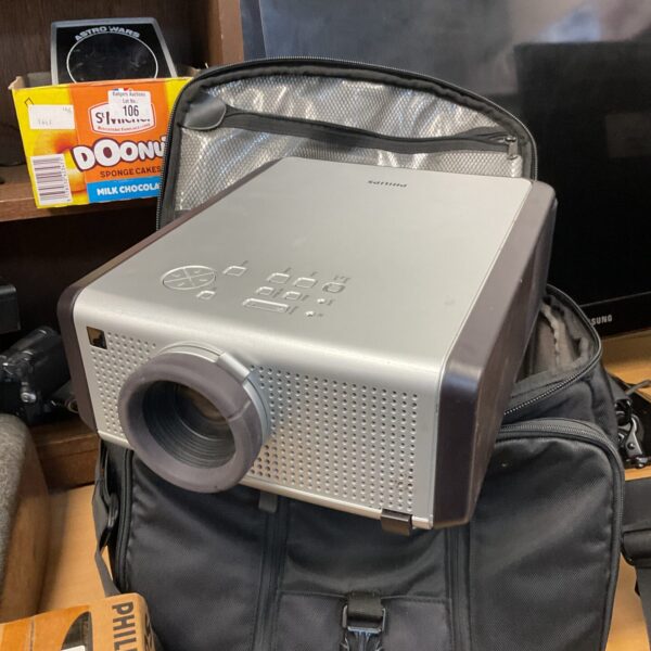 Philips portable projector with carry case and screen.