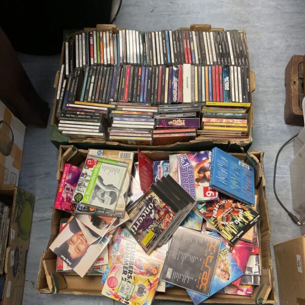 Large collection of music CDs in storage trays.