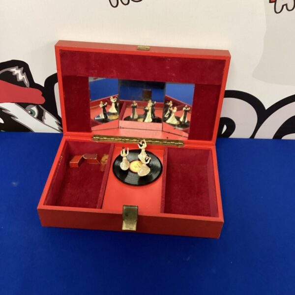 Vintage musical jewellery box with rotating ballerina figurine.