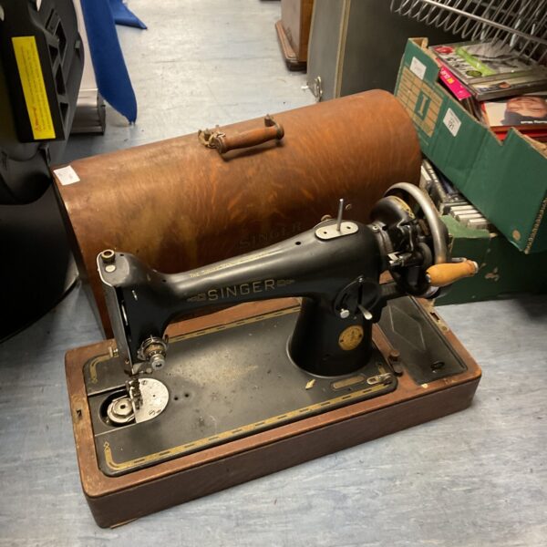 Vintage Singer sewing machine in its original case.