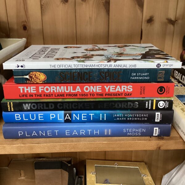 Collection of documentary books including Blue Planet II and Planet Earth II.