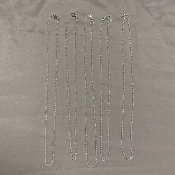 Five 925 silver necklaces in a lot, delicate chains.