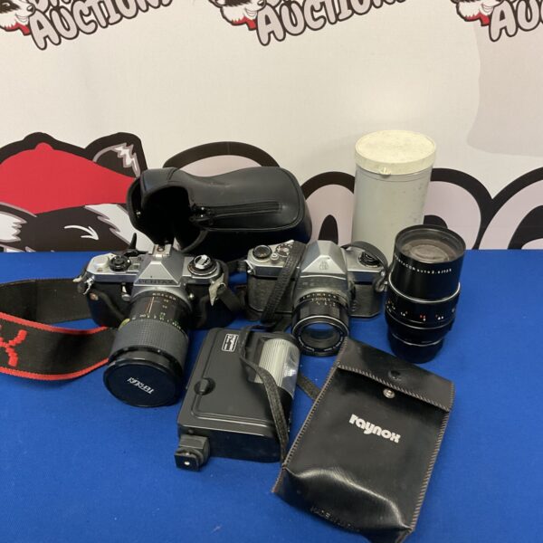 Vintage Pentax ME film camera with Asahi lens, a classic photography kit.