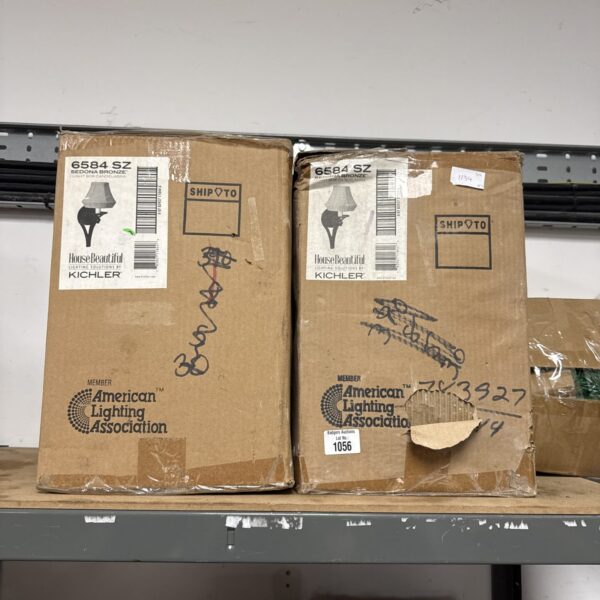 Box lot of two new Kichler candelabra lights in original packaging.