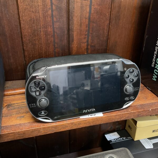 Sony PS Vita handheld gaming console in grey.