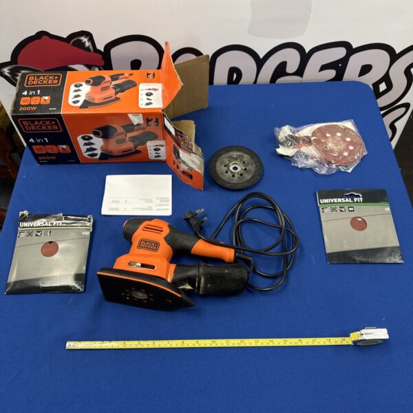 Used Black & Decker 4-in-1 electric sander for DIY home improvement projects.