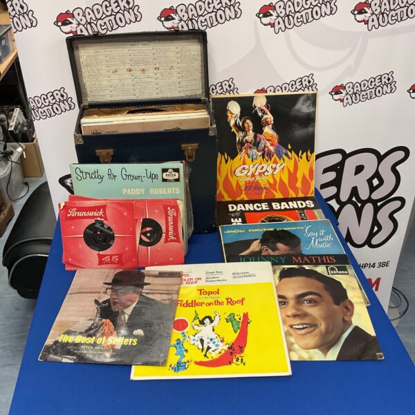 Vintage vinyl record carrying case with patterned exterior.