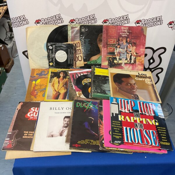 Lot of vintage vinyl records for music collectors.