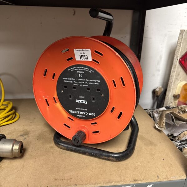 Orange Lyvia 30m extension reel for garden and outdoor use.