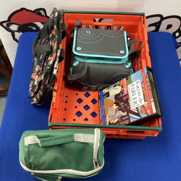 Mixed lot of French learning materials and child items including a book and pouch.