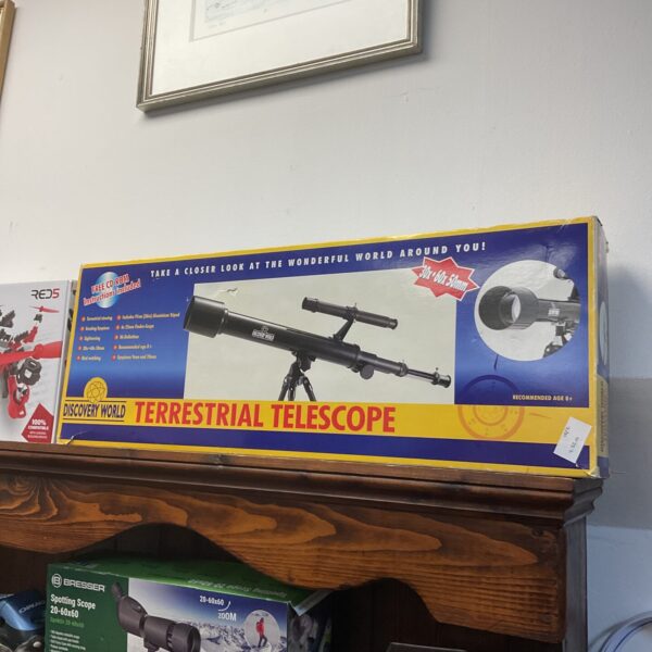 Discovery World terrestrial telescope in original packaging.