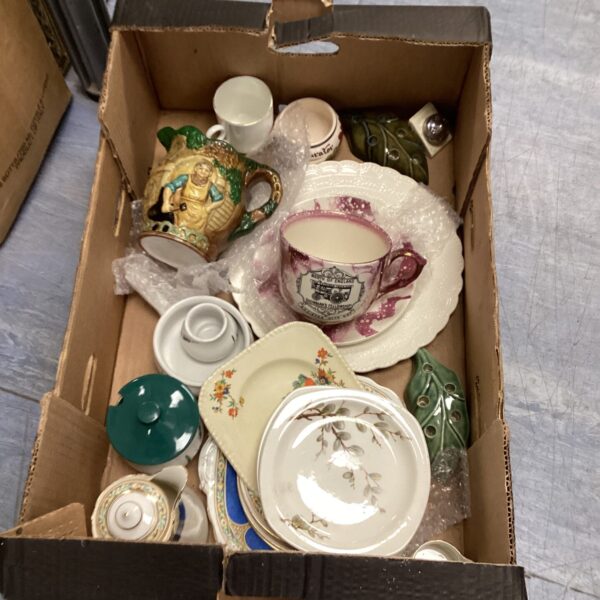 Mixed pottery lot featuring a large Staffordshire tea cup and saucer.