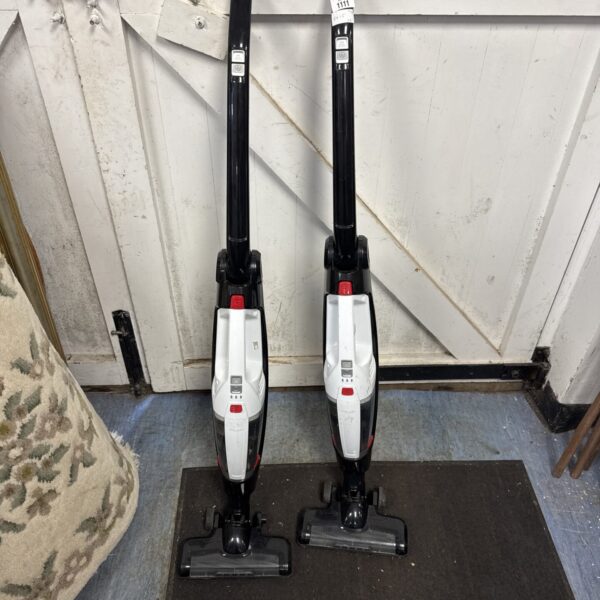 Two John Lewis cordless hoovers for easy home cleaning.